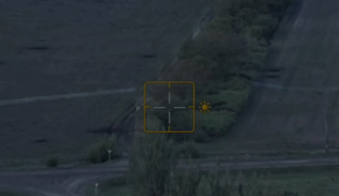 Russian soldiers on motorcycles detonate mine, get stuck in barbed wire, nearly hit by incoming FPV and detonate another mine as they flee, the other motorcycle crew got hit by drone-dropped munitions, detonating the fuel tank [May 2025]