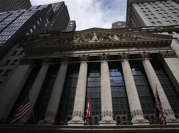 Wall Street and other markets hold steady ahead of U.S.-China meeting