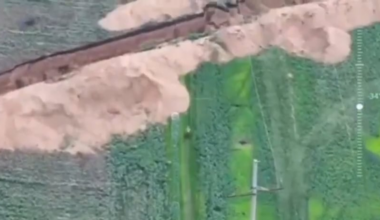 A russian soldier on a motorcycle tried a high-speed jump over an anti-tank ditch but faceplanted into it [May 2025]