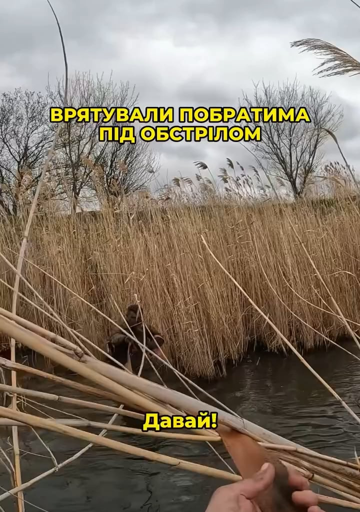 Ukrainian Armed Forces Pull Wounded Soldier Through Water Under Fire