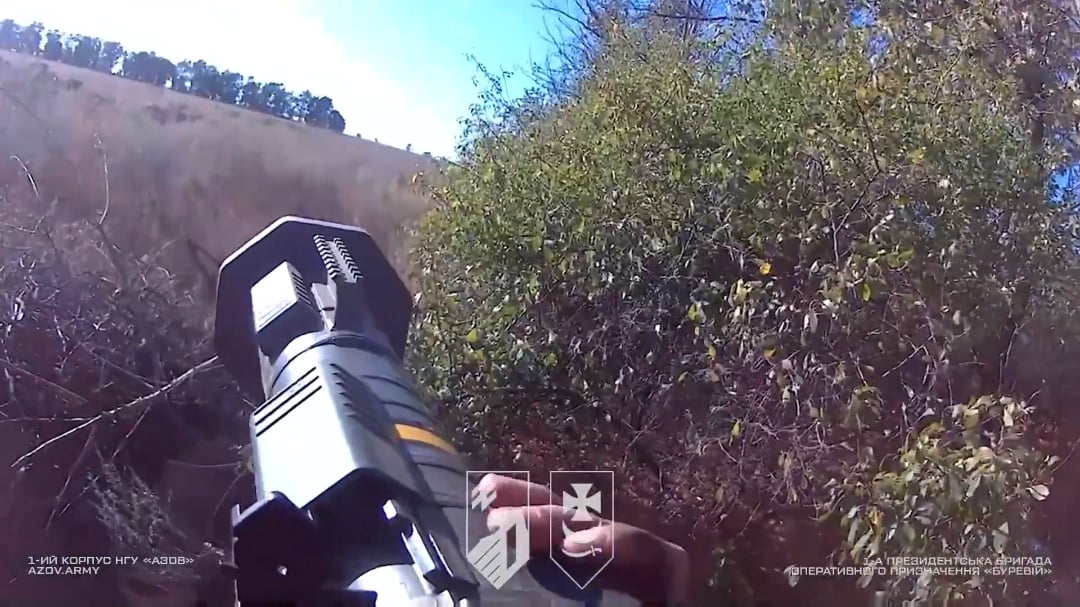 Ukrainian soldiers of the 1st Army Corps "Azov" (unit "storms" of the 1st Presidential Brigade Bureviy, NGU) suppressed Russian positions with small arms fire and AT-weapons. May 2025, Kharkiv region.