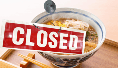 A bowl of ramen with a Closed sign superimposed over it