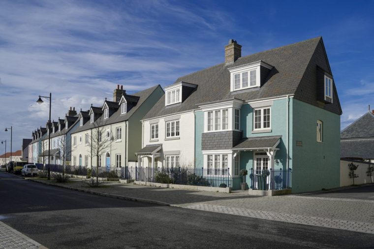 NEWQUAY, ENGLAND - OCTOBER 29: A street view in Nansledan, on October 29, 2021 in Newquay, England. Nansledan is the second development whose architecture and urban planning is championed by HRH The Prince Of Wales. Back in the 1990's the first Duchy of Cornwall development, Poundbury, was built on the outskirts of Dorchester, Dorset. The experimental new town was met with mixed reactions but 30 years on it is has been a great success. This second endeavour built on 540 acres of Duchy farmland is an extension to the Cornish coastal town of Newquay. The Prince's vision is, once again, to combine mixed-income housing with shop, offices and leisure facilities so that the needs of the community are met within walkable neighbourhoods. Over the next 30 years Nansledan will evolve into a large community of more than 4,000 homes centred around a pleasant green space and high street. Nansledan is designed and being built to enhance the quality of life, strengthen community bonds and give people a sense of pride in where they live. Completed buildings draw on traditional regional styles and use local materials and craftsmanship. Holiday letting is banned and it is estimated the 60% of the buyers, so far, are local. (Photo by Hugh Hastings/Getty Images)