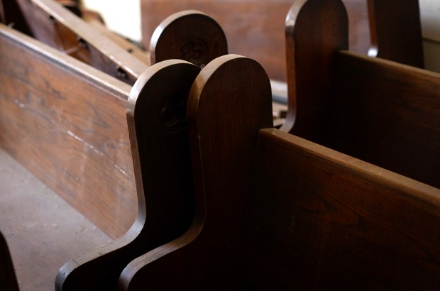 Discarded pews at St. Mary of the Assumption Church on...