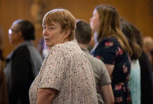 Diane Sheeran sings during Mass on May 11, 2025, at Christ Our Savior Catholic Church in South Holland. The new pope attended St. Mary of the Assumption Parish in Riverdale which later consolidated with St. Jude to form Christ Our Savior. (Brian Cassella/Chicago Tribune)