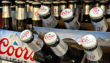 The maker of Coors Light and Miller is attributing lower revenue to macroeconomic trends and weaker demand.