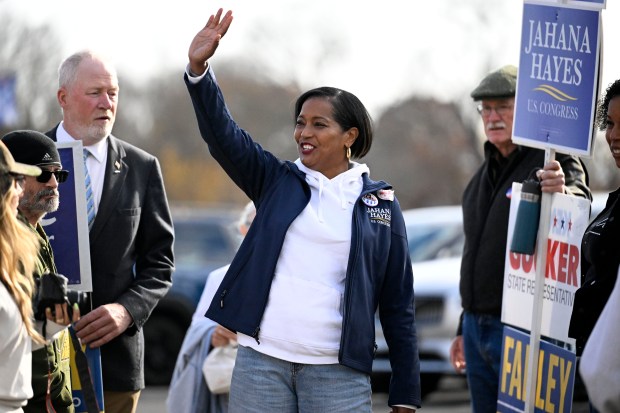 U.S. Rep. Jahana Hayes, D-Conn., waves to people voting on Election Day, Tuesday, Nov. 5, 2024 in Danbury, Conn. (Jessica Hill/Special to the Courant)