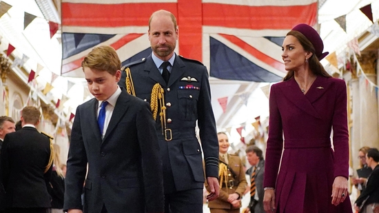 (From L) Britain's Prince George of Wales, Britain's Prince William, Prince of Wales and Britain's Catherine, Princess of Wales arrive for a tea party organised for Second World War veterans at Buckingham Palace on May 5, 2025.(AFP)
