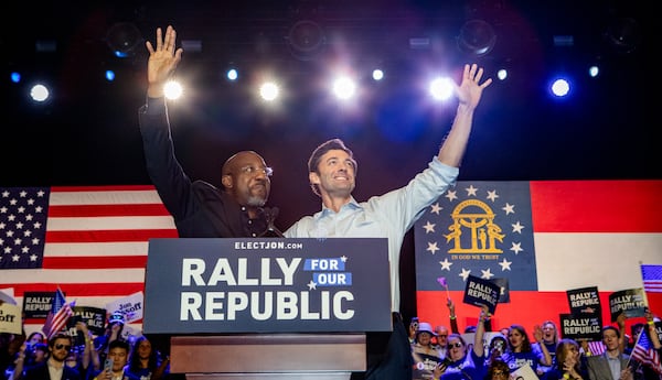 U.S. Sen. Raphael Warnock (left) introduces U.S. Sen. Jon Ossoff to the stage during a “Rally for the Republic” at The Eastern on March 22, 2025. Both senators are Georgia Democrats. (Jenni Girtman for the AJC)