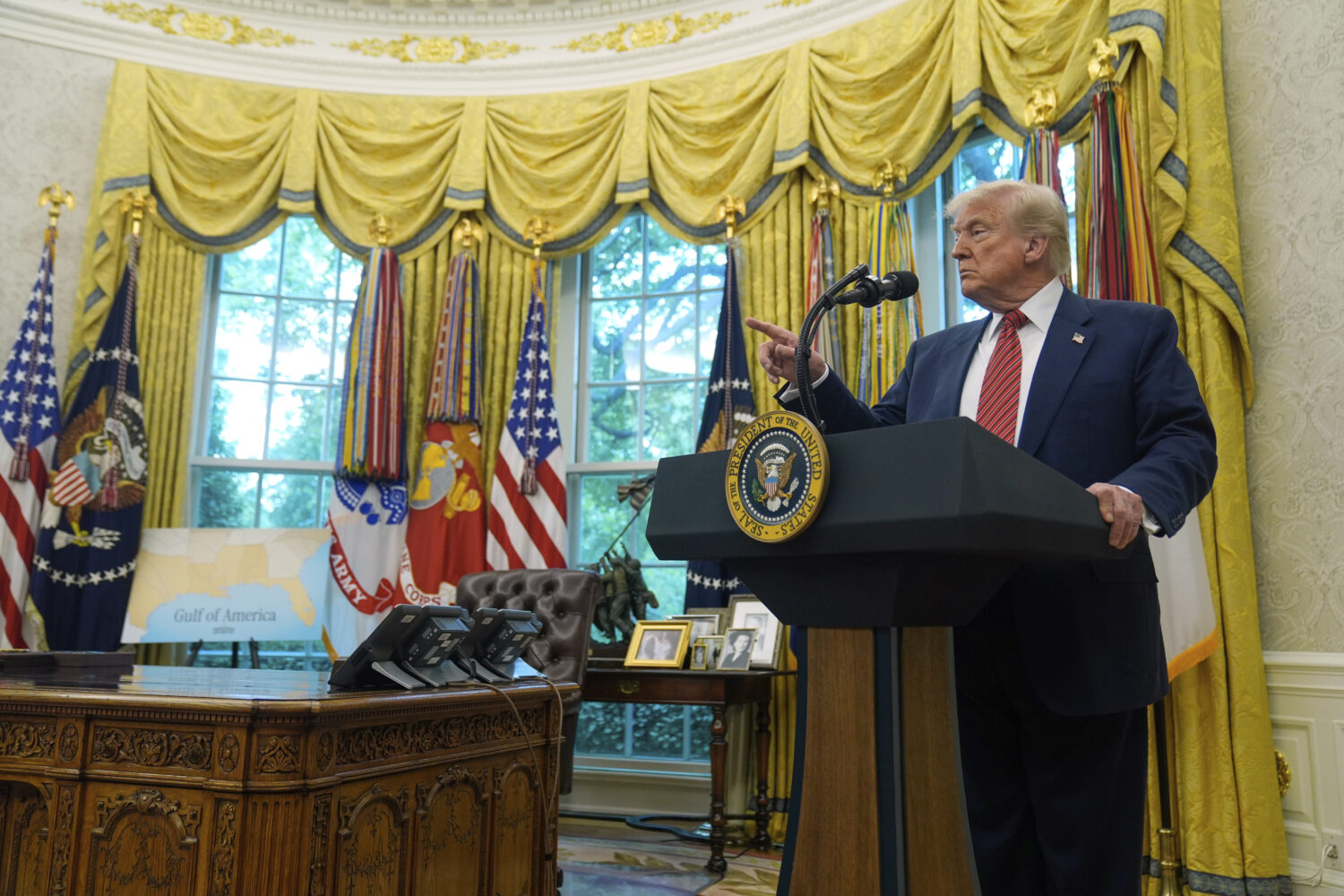 President Donald Trump speaks to reporters after David Perdue was sworn in as U.S. Ambassador to Ch...