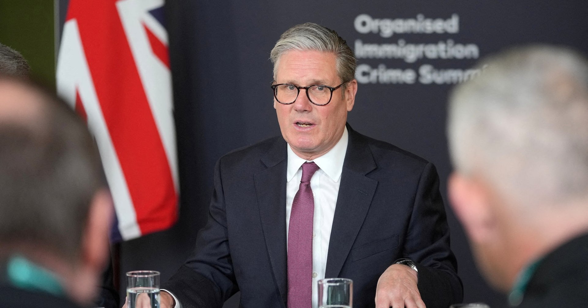 UK plans to end 'failed free market experiment' in immigration