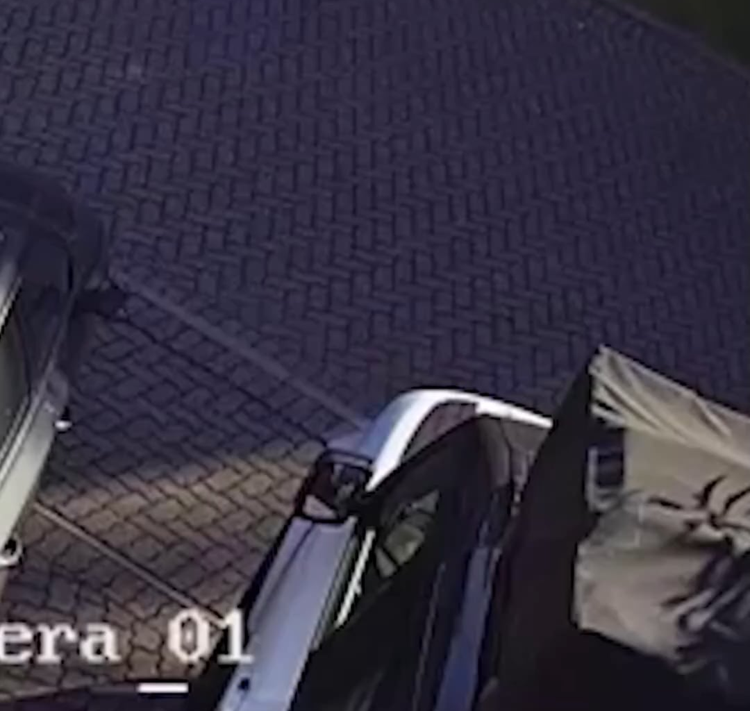 Family targeted in gang war demand to be left in peace as new images of masked hoods emerge