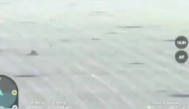 A Ukrainian drone watches as a russian infantry biker drives across a field and hit a mine.