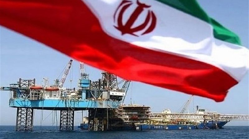Iran flag and oil platform. Photo Credit: Tasnim News Agency