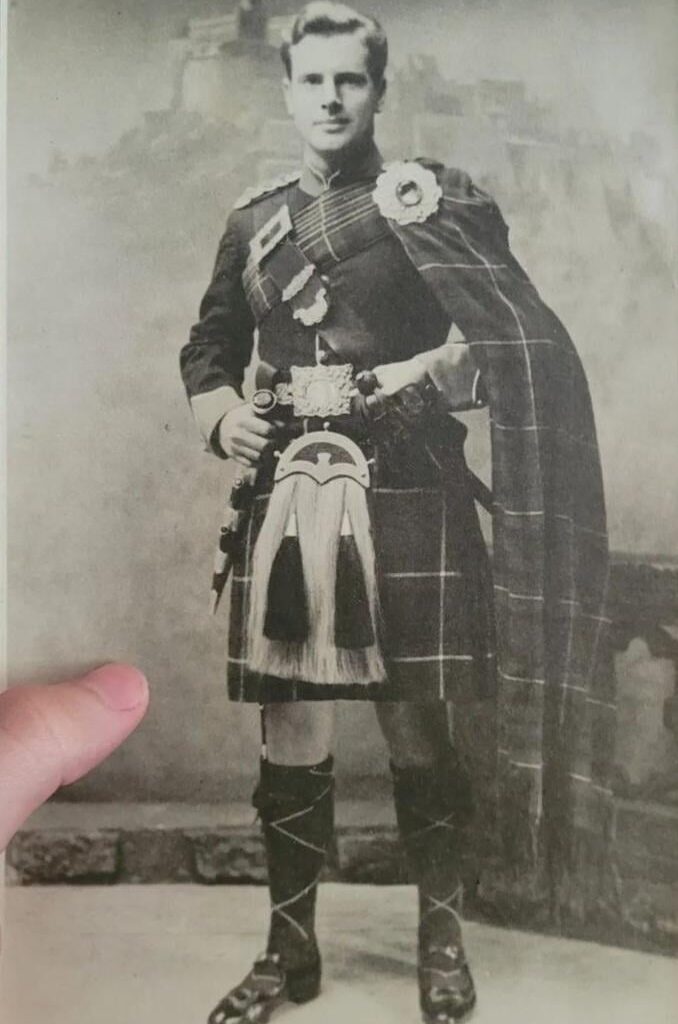 Can anyone identify the outfit my grandpa is wearing and castle in the background?