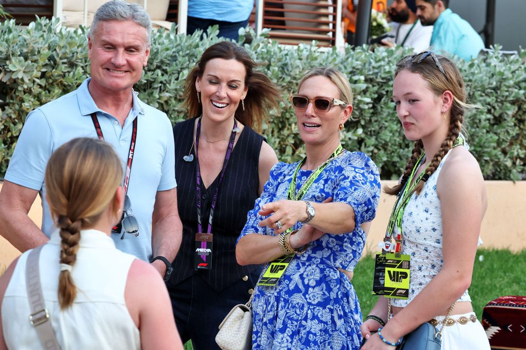 people chatting at Formula 1 event