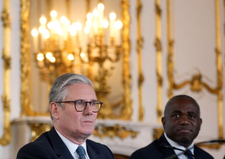 Britain's Prime Minister Keir Starmer and Foreign Secretary David Lammy attend a meeting.
