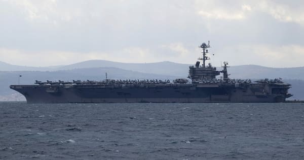 US fighter jet landing on aircraft carrier goes overboard