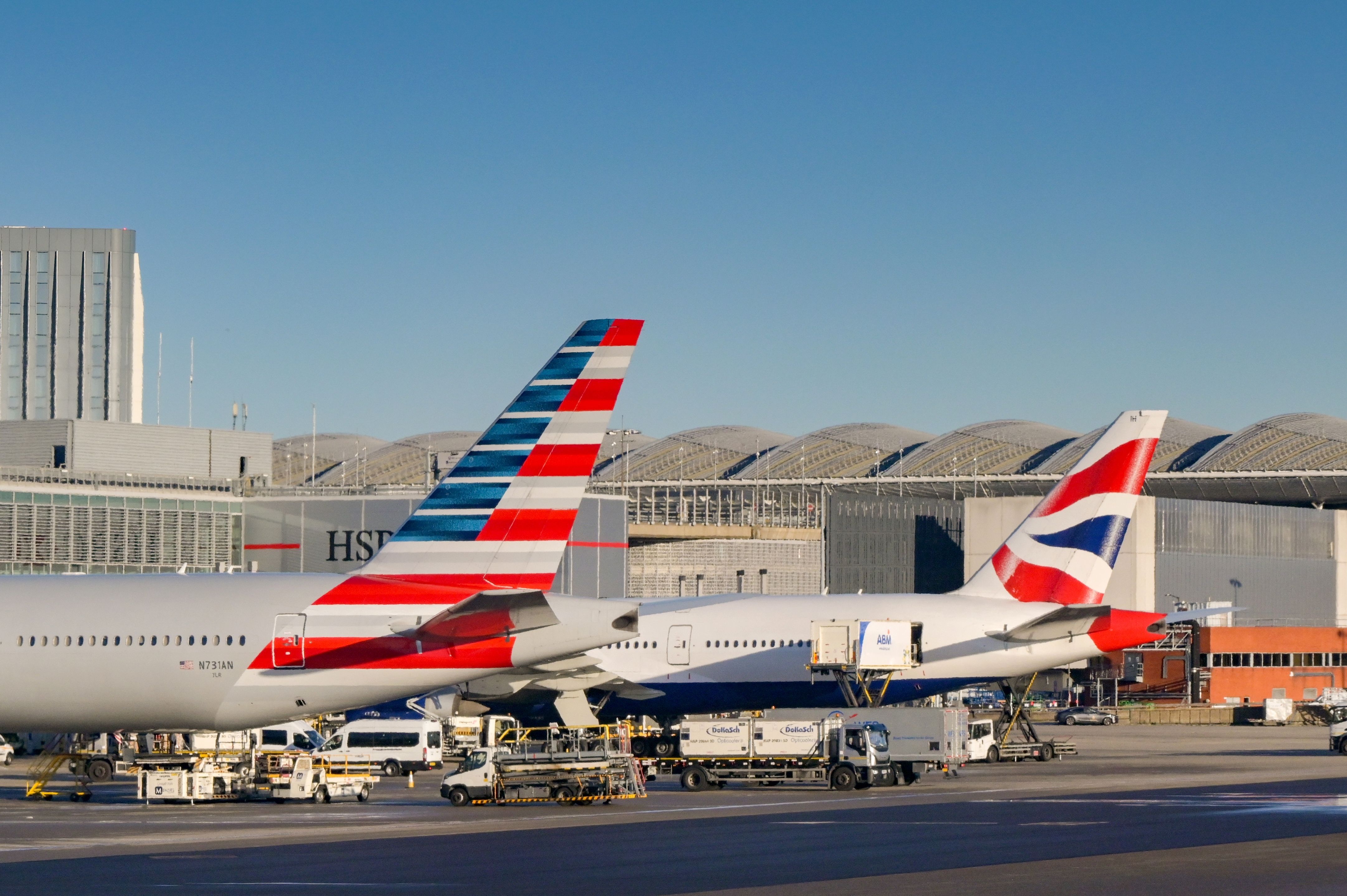 American Airlines and British Airways aircraft at LHR shutterstock_2578871497