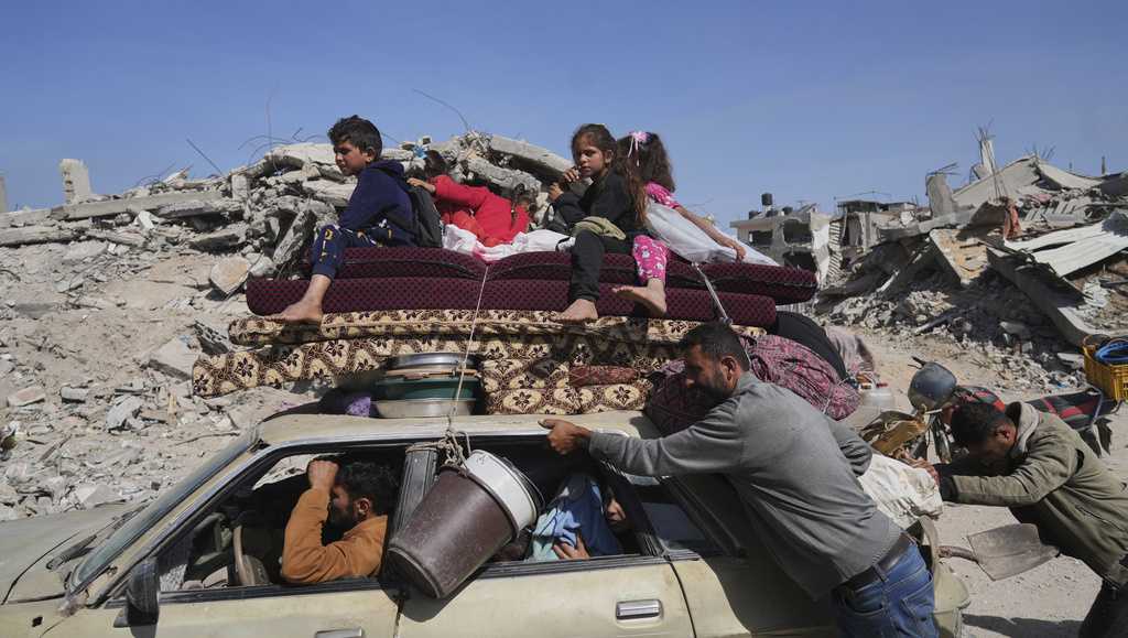 Israel escalates Gaza strikes, killing at least 93, officials say