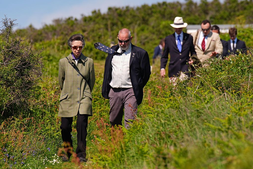 The Princess Royal walking along the East Coast Path in Sark, as she attends commemorations in Sark to mark its Liberation anniversary. Picture date: Saturday May 10, 2025.