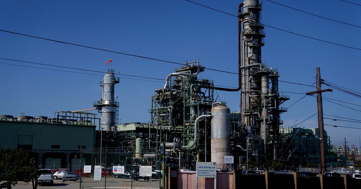 Chevron Slashes Buybacks as Trump Trade War, OPEC Hit Oil