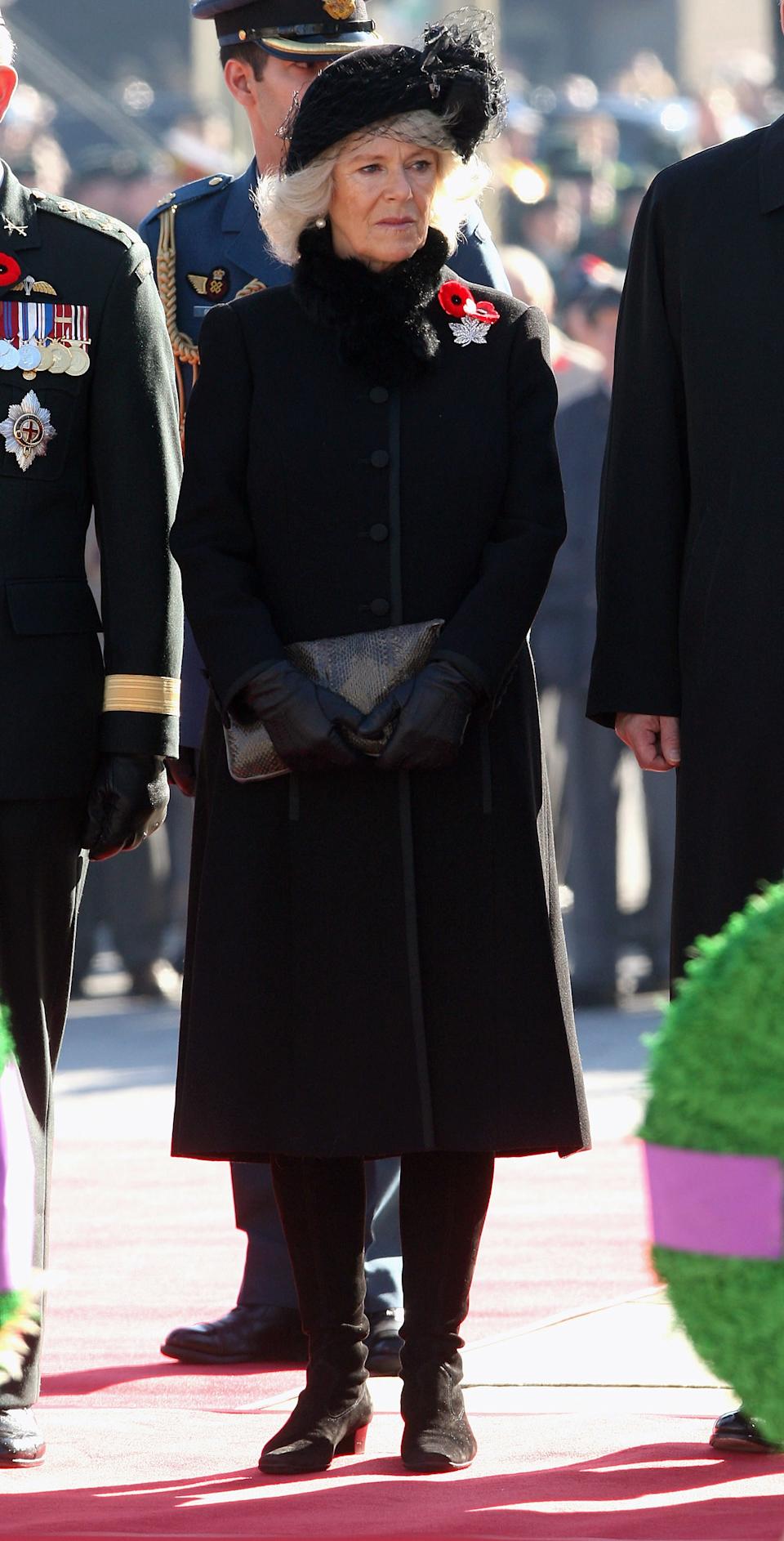 OTTAWA, ON - NOVEMBER 11: Camilla, Duchess of Cornwall attends a Remembrance Day Service at the National War Memorial on November 11, 2009 in Ottawa, Canada. The Royal couple are visiting Canada from November 2 to November 12 and will participate in commemorations and celebrations that honour Canada's persons, places and events. This is the Prince of Wales's 15th visit to the country, however, it will be the Duchess of Cornwall's fist official visit to a country where she has strong ancestral links. (Photo by Chris Jackson/Getty Images)