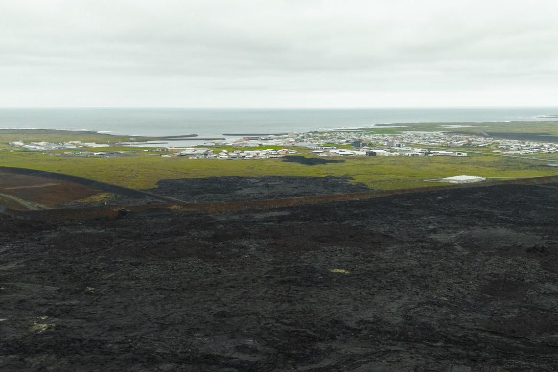 stvolcano26 - The grass is greener on the other side - Magma diverted from the town of Grindavik, a fishing town which had nearly 4,000 residents. It has been largely evacuated since November, but infrastructure has mostly been spared from lava damage due to the barriers.

PHOTO: ERIC TEO