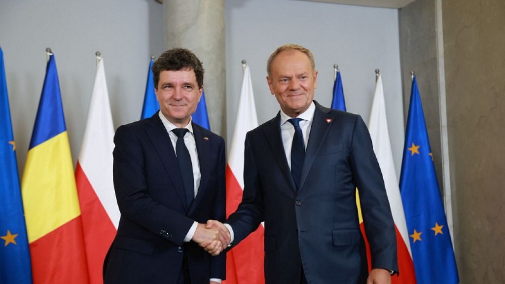 Romanian president-elect visits Poland's Tusk, lends support to Trzaskowski ahead of election runoff