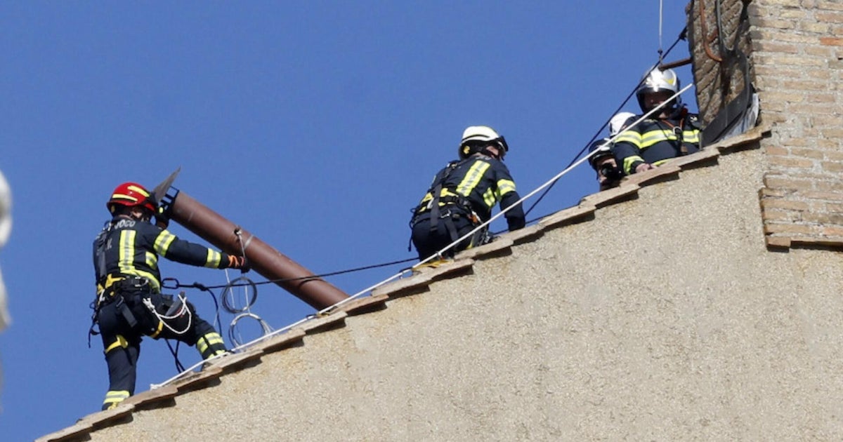 Vatican installs chimney that will alert of new pope as conclave nears