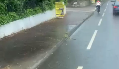 Dad and kid riding a bike