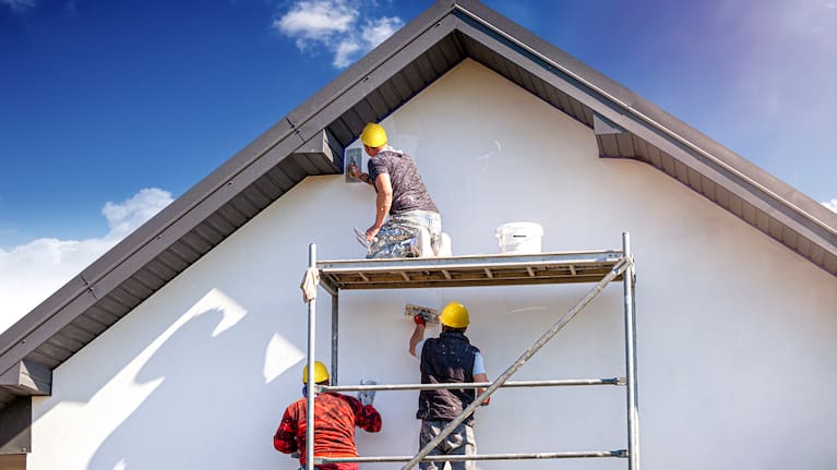 Builders fixing up a property.
