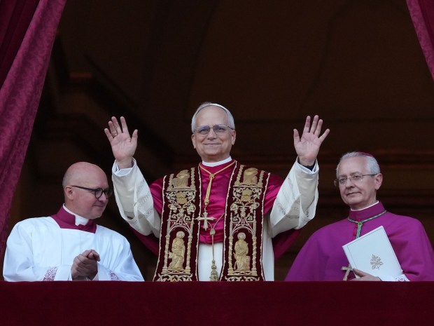 The newly elected pontiff, Pope Leo XIV, is seen for...
