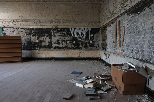 Books and VHS tapes are left in a classroom in...