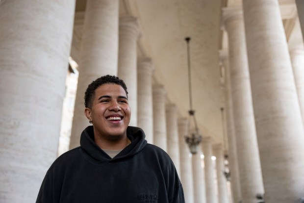 Caleb Ham, 19, talks in St. Peter's Square on May 15, 2025, about spending his freshman year in Rome with Loyola University Chicago's program. He extended his semester to attend the installation of Pope Leo XIV at the Vatican. (Brian Cassella/Chicago Tribune)