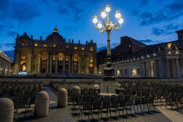 Chairs are set up in St. Peter’s Square on May...