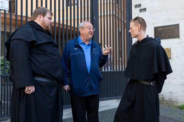 Augustinians, from left, Rev. Joe Roccasalva, Rev. Bernie Scianna and Rev. Jack Tierney talk outside the Augustinian General Curia after their arrival in Rome on May 17, 2025, before the installation of Pope Leo XIV at the Vatican. Roccasalva grew up in Beverly and attended Marian Catholic, Scianna is a Pilsen native now at Villanova University and Tierney is a former teacher at St. Rita in Chicago. (Brian Cassella/Chicago Tribune)