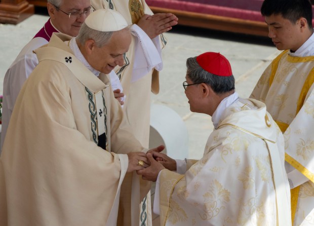 Pope Leo XIV receives the fisherman’s ring from Cardinal Luis...