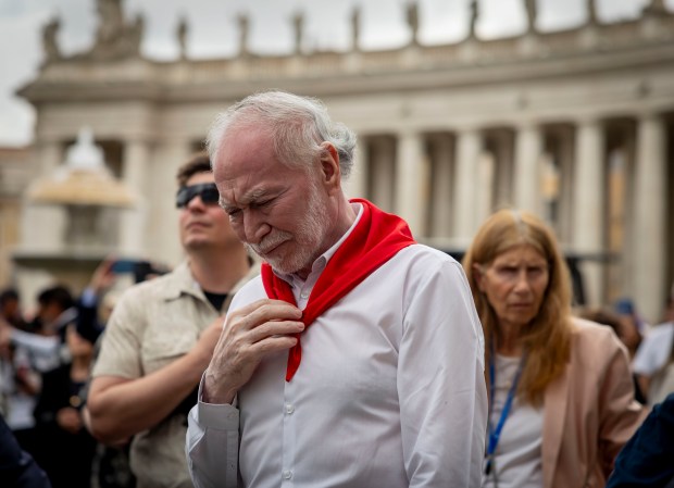 People listen while Pope Leo XIV holds his first general audience on May 21, 2025, in St. Peter's Square at the Vatican. (Brian Cassella/Chicago Tribune)