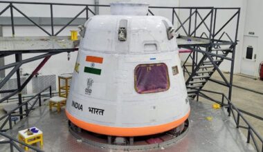 A view of a white module with the Indian flag painted on the side.