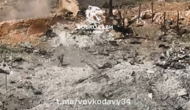 After the Russian soldier is wounded, his comrade grabs his rifle and quickly scrambles back into his hole. Vovchansk, Kharkiv Region