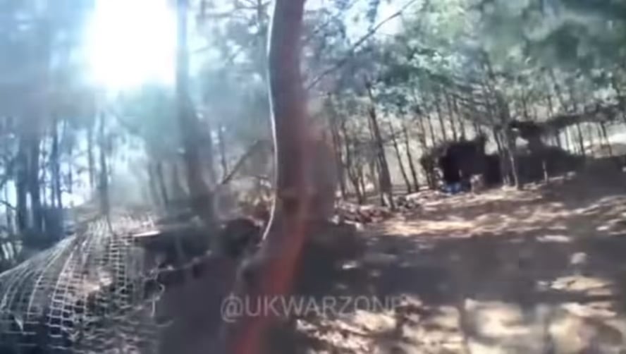 Ukrainian soldier takes out a Russian drone with his double barrel shotgun. Unknown location.