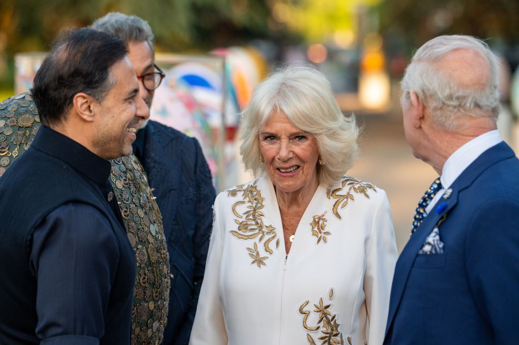 queen camilla in white tunic 
