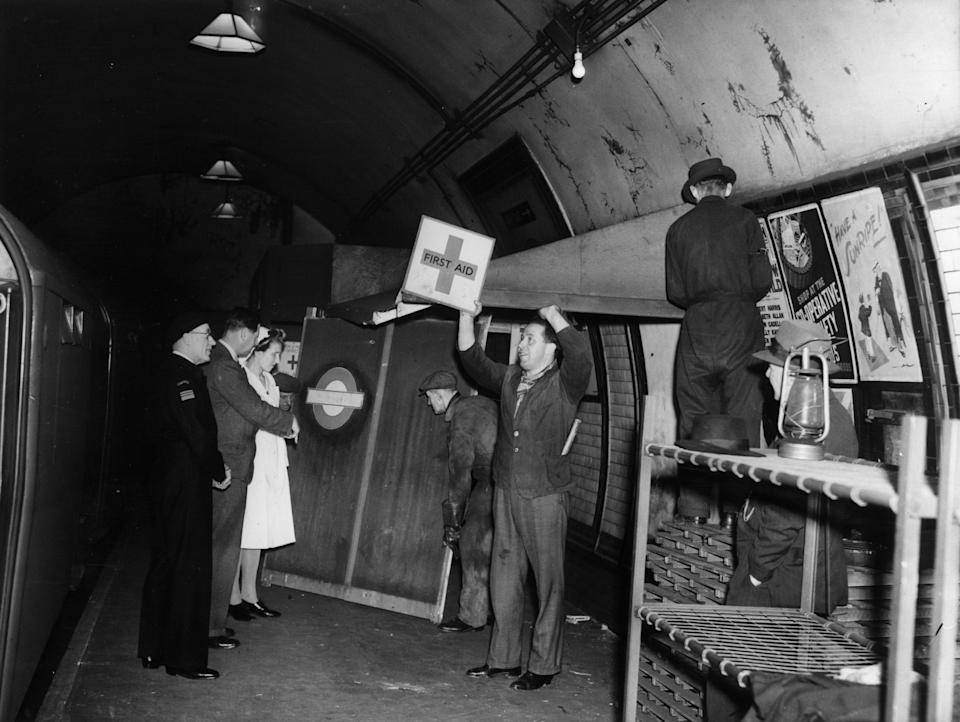 31st May 1945: The demolition of one of the remaining shelter bunks in a London underground station at the end of the Second World War. (Photo by Fox Photos/Getty Images)