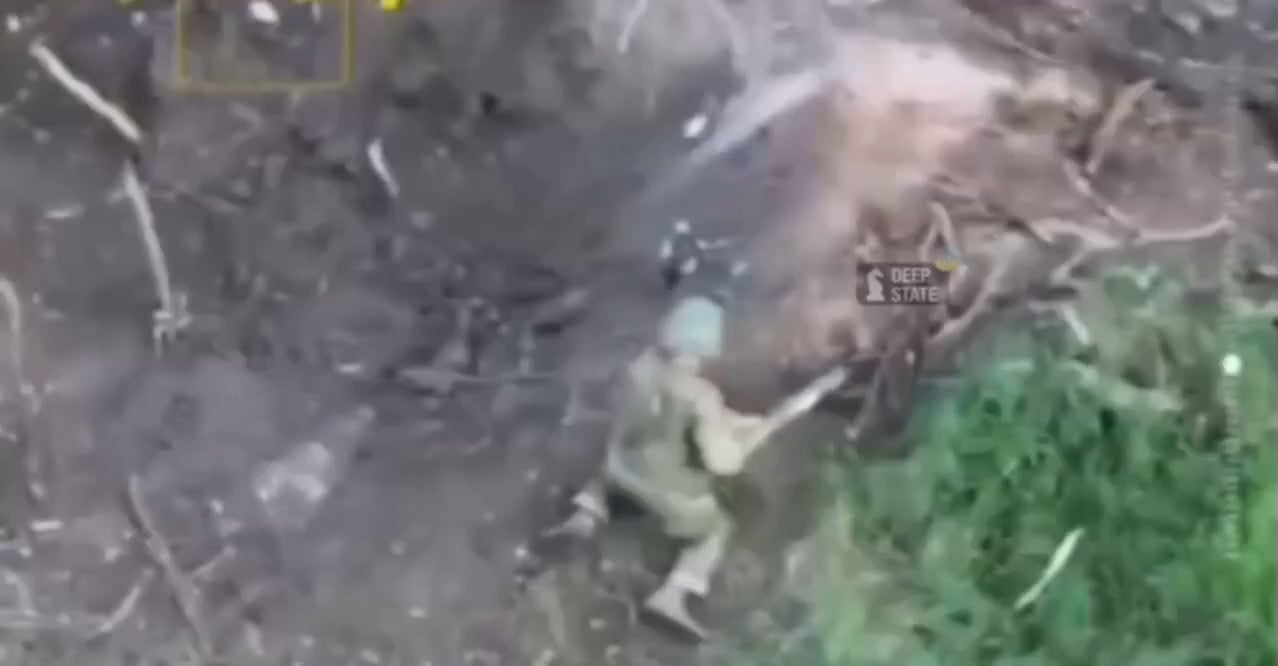 A Russian soldier decides to defuse an unexploded Ukrainian FPV quad with a stick.