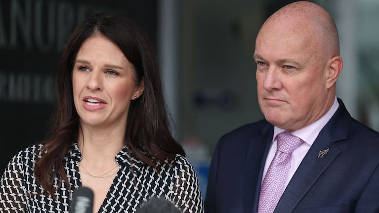 Erica Stanford, seen here with Prime Minister Christopher Luxon, has had to front over high profile changes in her time as Education Minister.