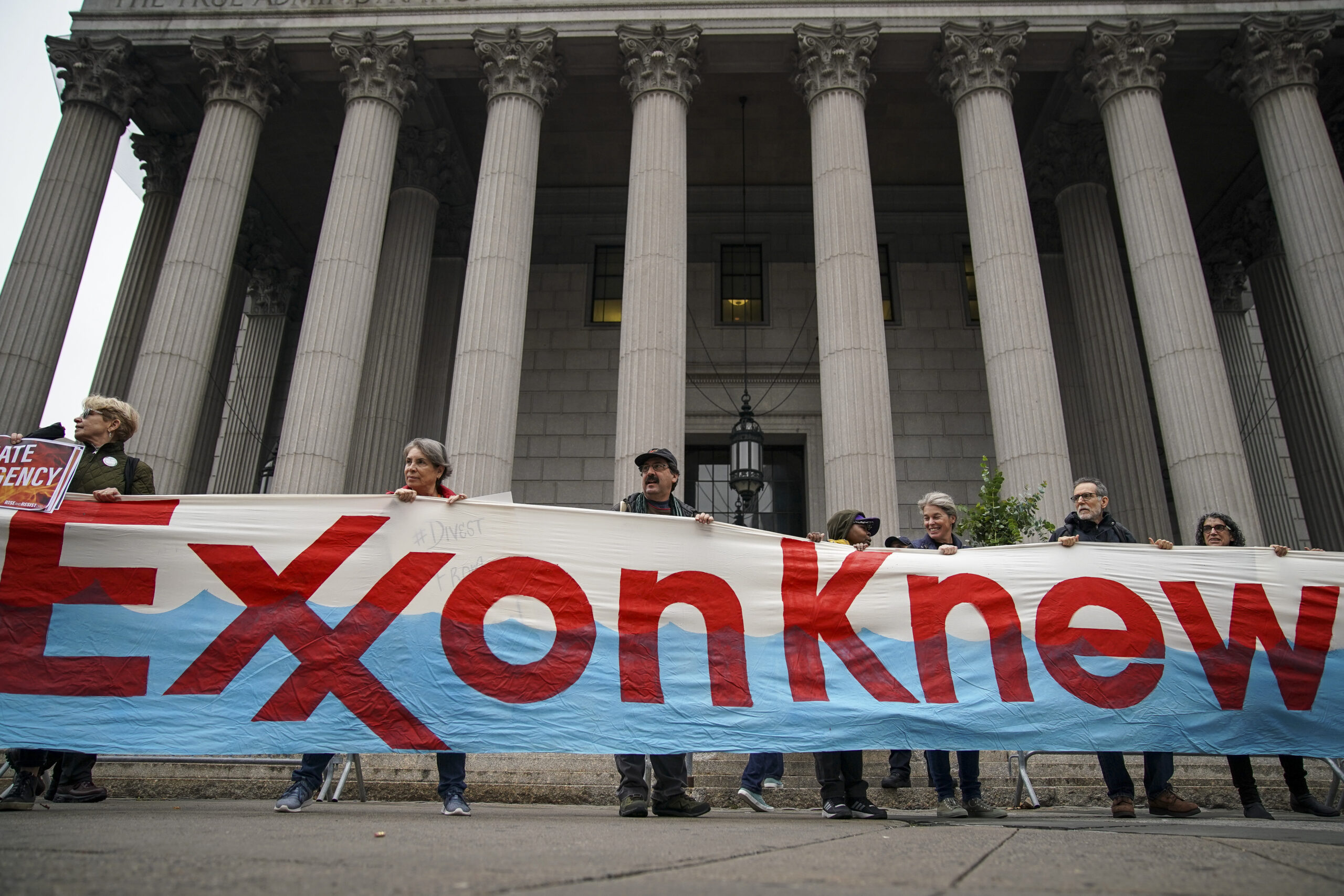 Environmental activists rally for accountability from fossil fuel companies outside of the New York Supreme Court on Oct. 22, 2019, in New York City. Credit: Drew Angerer/Getty Images
