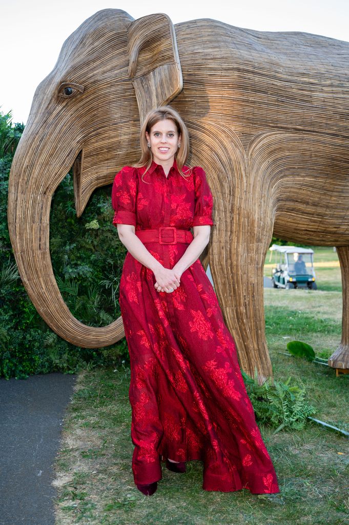 Princess Beatrice wearing a red dress by Rebecca Vallance attends The Elephant Family Evening of Art and Conservation at Kew Gardens on May 13, 2025 in London, England