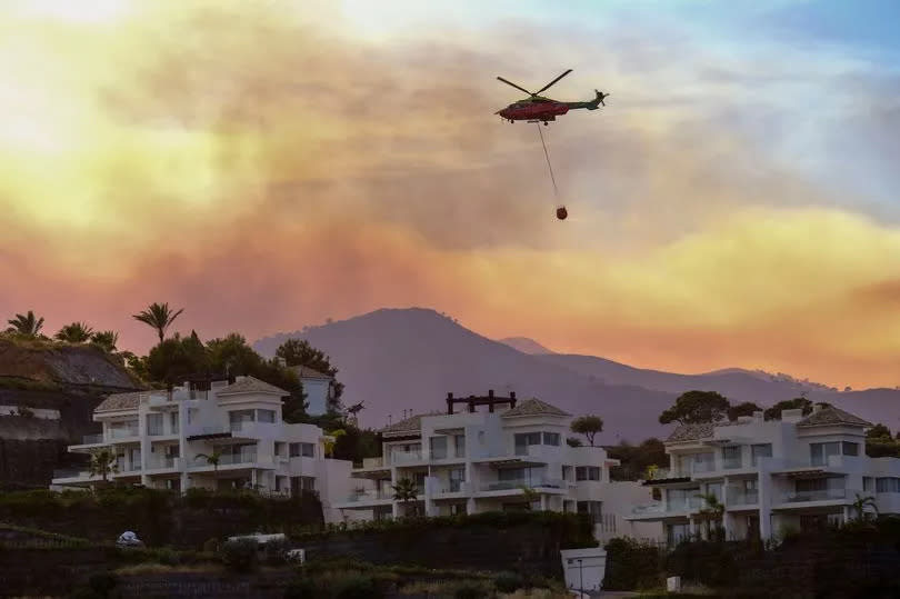 Orange smoke over Spanish mountains