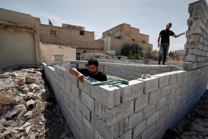 Reconstruction of a damaged house in Daraya, Syria, on March 17, 2025.